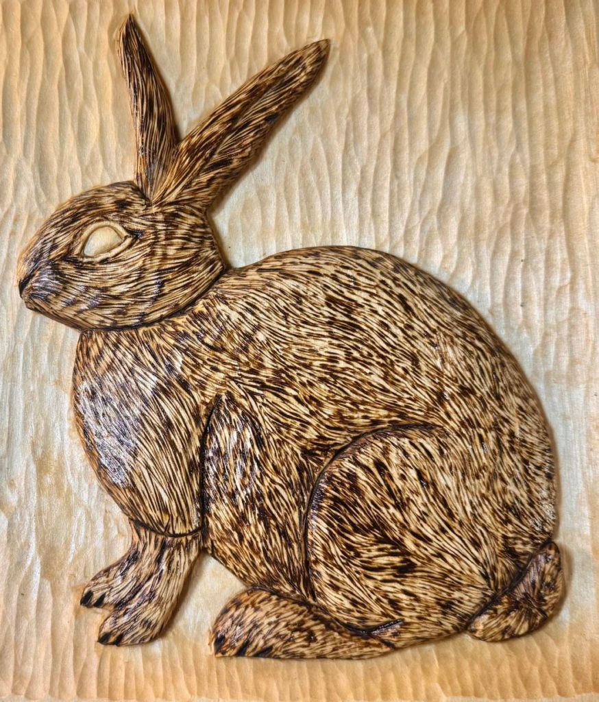 Hare using relief carving and pyrography by Dan Patton.